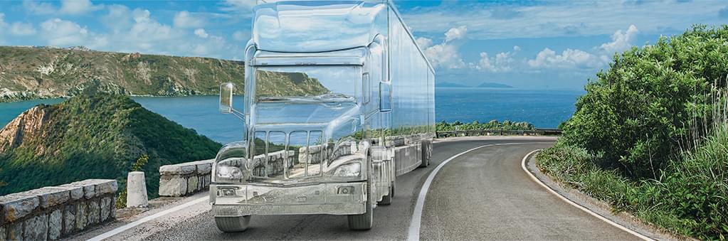 Transparent bus driving by a city